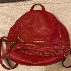 Red Michael Kors leather backpack